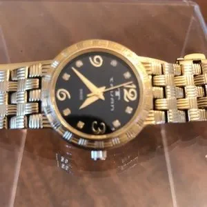 Tauan | Accessories | Tauan Gold Tone Band Black Face Swiss  display picture 3
